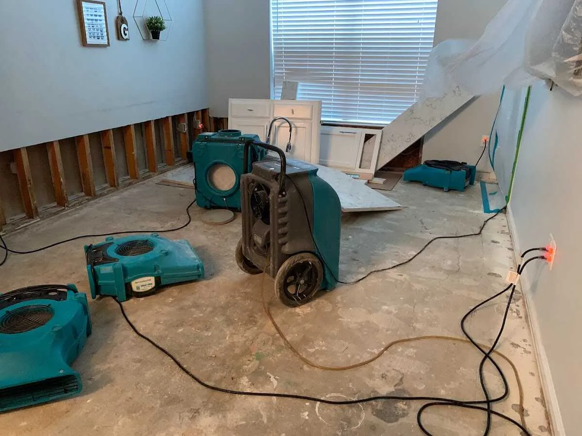 Dehumidifier in flood-cut room for Water Damage Restoration in Fellsmere
